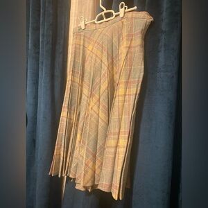Sold. Vintage pleated skirt in pastel plaid size 10